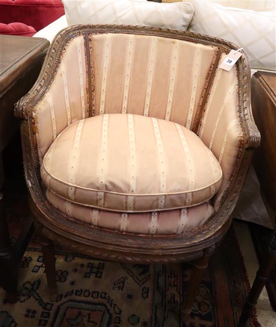 An early 20th century French carved beech tub chair, Width 60cm